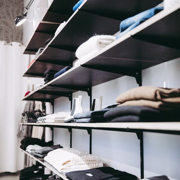 Contemporary retail shop interior with computerized checkout and stock tracking system