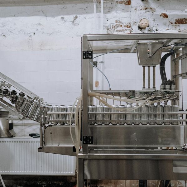 Industrial manufacturing plant with automated assembly line and digital controls